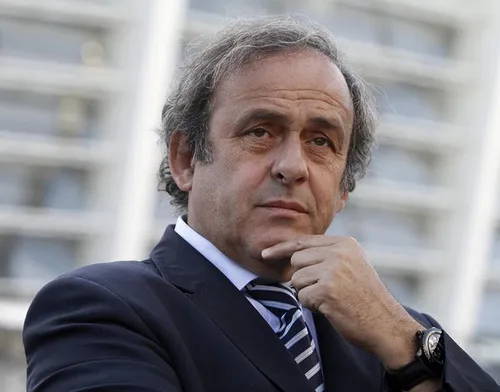 UEFA President Michel Platini are seen in front of a stadium in Kiev