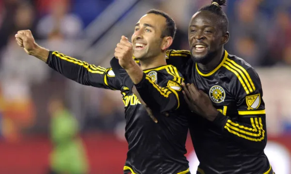Columbus Crew Justin Meram, left, celebrates with Kei Kamara after Meram scored a goal during the first half of an MLS soccer match against the New York Red Bulls, Saturday, Oct. 3, 2015, in Harrison, N.J. (AP Photo/Bill Kostroun) ORG XMIT: NJBK101