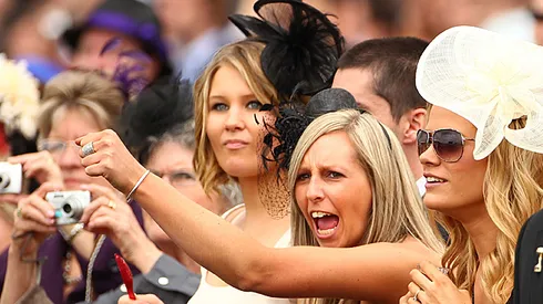 MELBOURNE, AUSTRALIA - NOVEMBER 02: A spectator cheers during race four The Herald Sun Stakes during Melbourne Cup Day at Flemington Racecourse on November 2, 2010 in Melbourne, Australia. (Photo by Robert Cianflone/Getty Images)