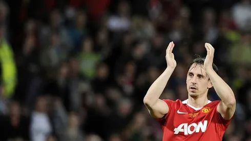 Manchester United's Gary Neville applauds the crowd during his testimonial soccer match against Juventus in Manchester, northern England, May 24, 2011. REUTERS/Nigel Roddis (BRITAIN - Tags: SPORT SOCCER)