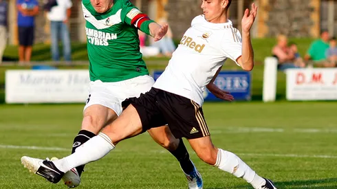 Football - Aberystwyth Town v Swansea City XI Pre Season Friendly - Park Avenue - 25/7/12 Aberystwyth Town's Sean Thornton (L) in action with Swansea City's Henry Jones Mandatory Credit: Action Images / James Benwell Livepic