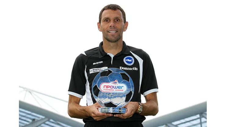 Pr Shoot - npower PR Shoot 09/09/2011 - The AMEX Stadium - 9/9/11 Brighton manager Gustavo Poyet with the Championship Manager of the Month trophy Mandatory Credit: Action Images / Peter Cziborra Livepic