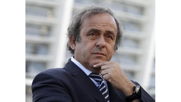 UEFA President Michel Platini are seen in front of a stadium in Kiev, September 27, 2011. The stadium is one of the venues for the Euro 2012 soccer tournament, to be hosted by Poland and Ukraine next year. REUTERS/Alexandr Kosarev (UKRAINE – Tags: SPORT HEADSHOT)