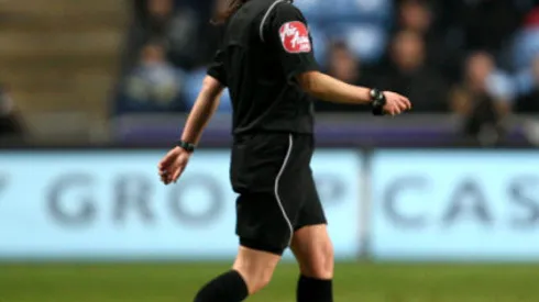 Female referee Amy Fearn comes on to take over from original referee Anthony Bates after he pulled a muscle in his leg