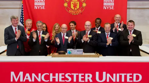 NEW YORK, NY - AUGUST 10: Manchester United Executives ring the Opening Bell at the New York Stock Exchange on August 10, 2012 in New York City. Manchester United Lists Initial Public Offering on the New York Stock Exchange. (Photo Ben Hider/NYSE Euronext)