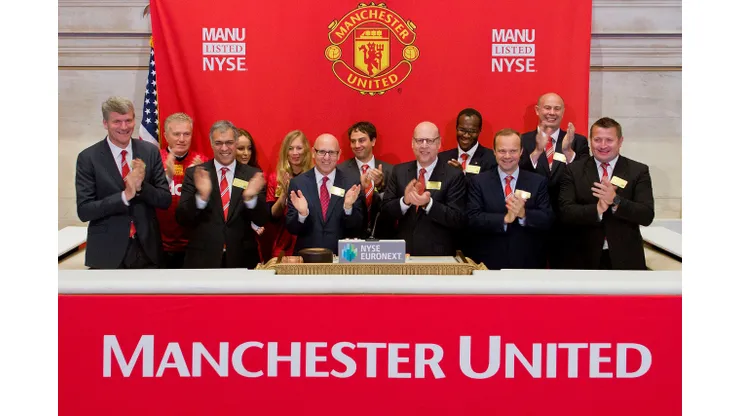 NEW YORK, NY – AUGUST 10: Manchester United Executives ring the Opening Bell at the New York Stock Exchange on August 10, 2012 in New York City. Manchester United Lists Initial Public Offering on the New York Stock Exchange. (Photo Ben Hider/NYSE Euronext)