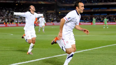 Landon Donovan of USA celebrates the winning goal with team mates
