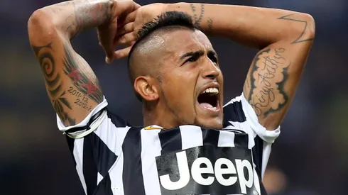 . Milan (Italy), 14/09/2013.- Juventus Chilean midfielder Arturo Vidal celebrates after scoring the 1-1 goal during the Serie A soccer match between Inter Milan and Juventus at the Giuseppe Meazza stadium in Milan, 14 September 2013. EFE/EPA/MATTEO BAZZI