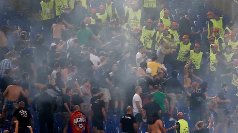 CSKA Moscow's supporters clash with stewards during the Champions League Group E soccer match against AS Roma at the Olympic Stadium in Rome September 17, 2014. REUTERS/Alessandro Bianchi (ITALY - Tags: SPORT SOCCER)