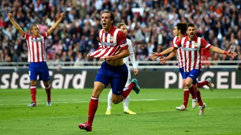 LISBON, PORTUGAL - MAY 24: Diego Godin of Club Atletico de Madrid celebrates scoring the opening goal during the UEFA Champions League Final between Real Madrid and Atletico de Madrid at Estadio da Luz on May 24, 2014 in Lisbon, Portugal. (Photo by Shaun Botterill/Getty Images)