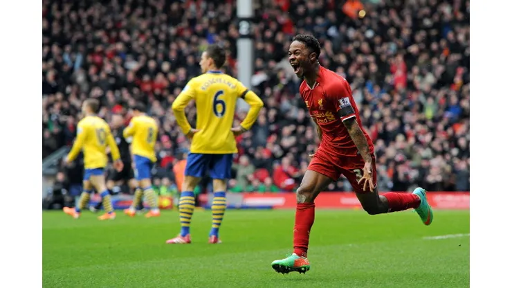 LIVERPOOL, ENGLAND – FEBRUARY 08: (THE SUN OUT, THE SUN ON SUNDAY OUT) Raheem Sterling of Liverpool celebrates his goal with Luis Suarez during the Barclays Premier League match between Liverpool and Arsenal at Anfield on February 8, 2014 in Liverpool, England. (Photo by John Powell/Liverpool FC via Getty Images)
