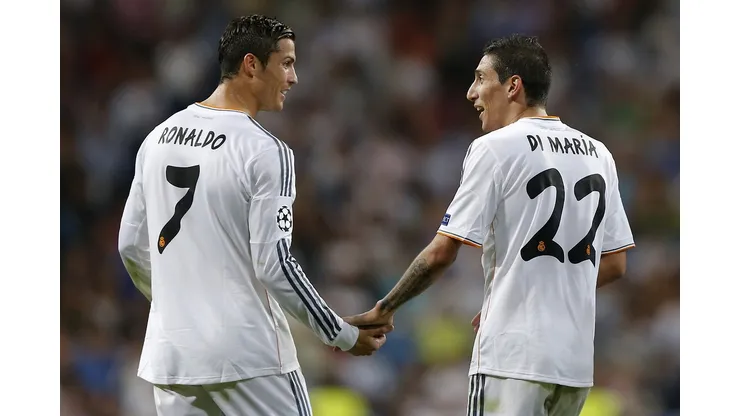 Real's Angel Di Maria, right is congratulated by Real's Cristiano Ronaldo after he scored during the Champions League group B soccer match between Real Madrid and FC Copenhagen at the Santiago Bernabeu stadium in Madrid, Wednesday, Oct. 2, 2013. (AP Photo/Daniel Ochoa de Olza)