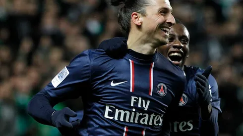 Paris Saint Germain's Zlatan Ibrahimovic celebrates after he scored a goal against Saint-Etienne during their French League One soccer match in Saint-Etienne, central France, Sunday, March 17, 2013. (AP Photo/Laurent Cipriani)