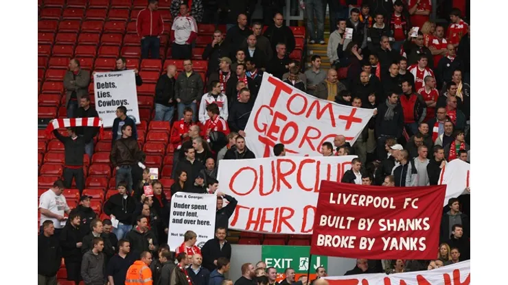 Liverpool, England – Tuesday, May 1, 2007: Liverpool's fans hold a banner – You can buy presidents, big planes, fancy yachts and tons of pies for fat frank, but you can never buy our history, in Kop before the UEFA Champions League Semi-Final 2nd Leg match against Chelsea at Anfield. (Pic by David Rawcliffe/Propaganda)