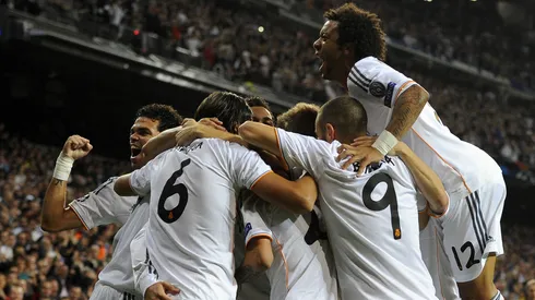 Real Madrid's players celebrate their first score the UEFA Champions League Group B football match Real Madrid CF vs Juventus at the Santiago Bernabeu stadium in Madrid on October 23, 2013. AFP PHOTO / JAVIER SORIANO (Photo credit should read JAVIER SORIANO/AFP/Getty Images)