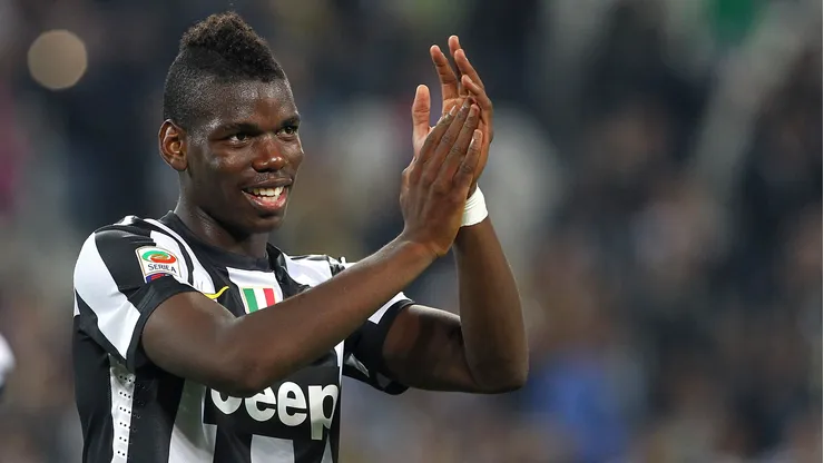 TURIN, ITALY – SEPTEMBER 22: Paul Pogba of FC Juventus salutes the crowd at the end of the Serie A match between FC Juventus v AC Chievo Verona at Juventus Arena on September 22, 2012 in Turin, Italy. (Photo by Marco Luzzani/Getty Images)