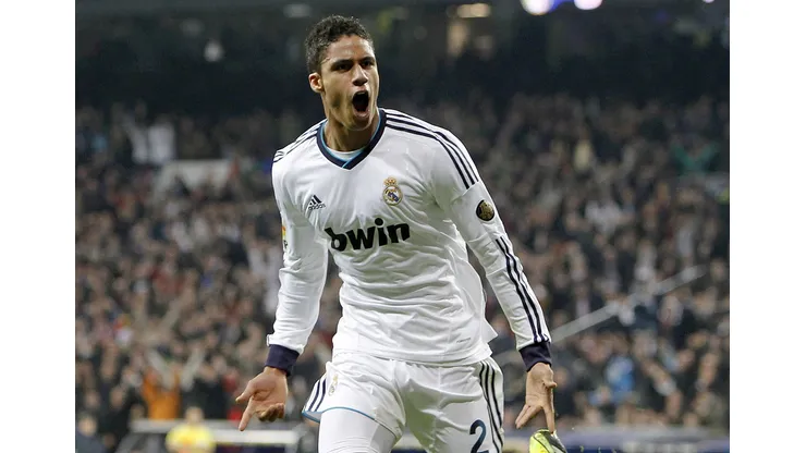 MADRID, SPAIN – JANUARY 30: Raphael Varane of Real Madrid celebrates after score during the Copa del Rey Semi-Final first leg match between Real Madrid CF and FC Barcelona at Estadio Santiago Bernabeu on January 30, 2013 in Madrid, Spain. (Photo by Angel Martinez/Real Madrid via Getty Images)