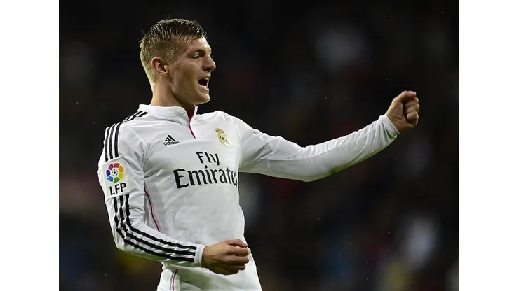 Real Madrid's German midfielder Toni Kroos celebrates after scoring a goal during the Spanish league football match Real Madrid CF vs Rayo Vallecano at the Santiago Bernabeu stadium in Madrid on November 8, 2014. AFP PHOTO/ JAVIER SORIANO (Photo credit should read JAVIER SORIANO/AFP/Getty Images)