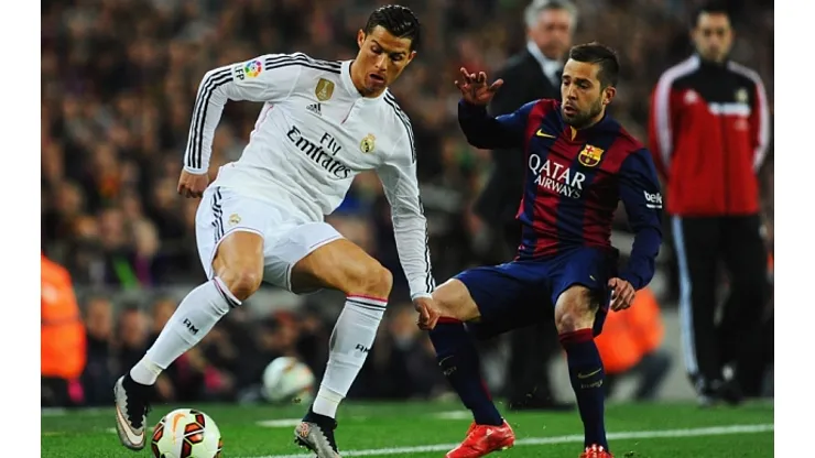 BARCELONA, SPAIN – MARCH 22: Cristiano Ronaldo of Real Madrid CF takes on Jordi Alba of Barcelona during the La Liga match between FC Barcelona and Real Madrid CF at Camp Nou on March 22, 2015 in Barcelona, Spain. (Photo by David Ramos/Getty Images)