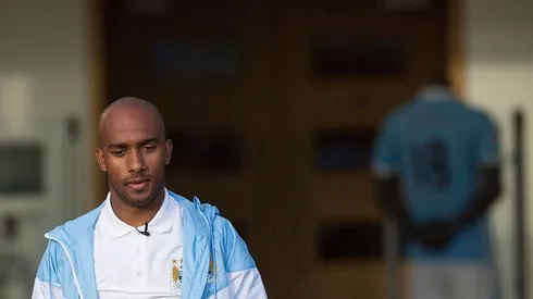 Fabian Delph applauds Manchester City fans after hearing boos at Villa Park