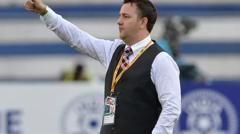 Guam football coach White joins rush to China