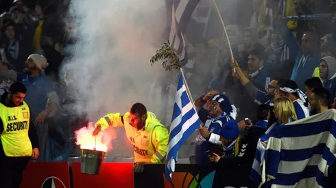 Australia vows five-year bans after Greece flare fracas