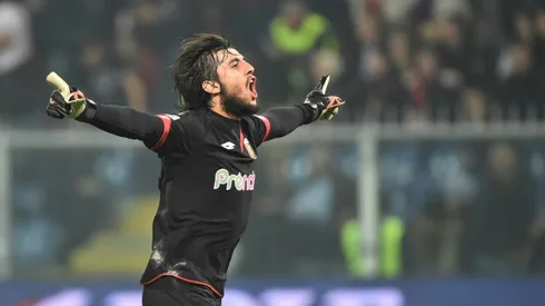 Genoa end 10-man Milan's bid for Serie A lead