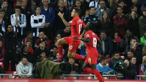 Liverpool beat Baggies but just miss top spot