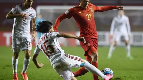 China football chief consoles players after shock Syria upset