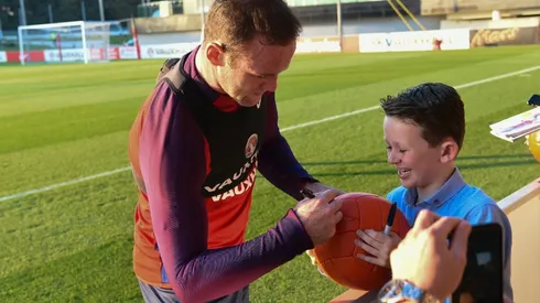 Rooney tired of debate over his best position