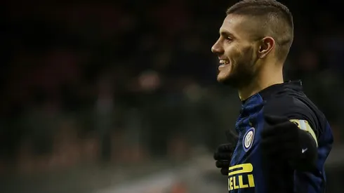 Icardi double helps Inter thwart 10-man Viola