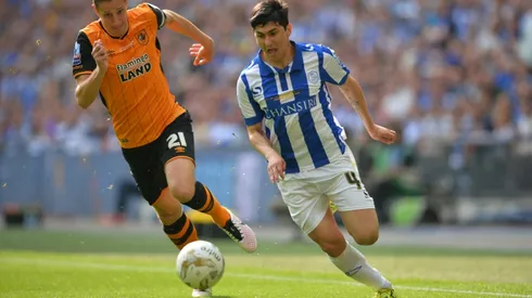 Hull City's Dawson header clips West Brom's wings