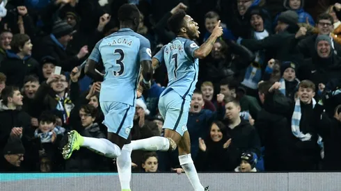 Sterling sinks Arsenal to reignite Manchester City