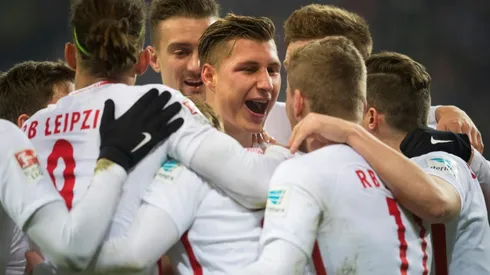 Leipzig down Hertha to knock Bayern from top