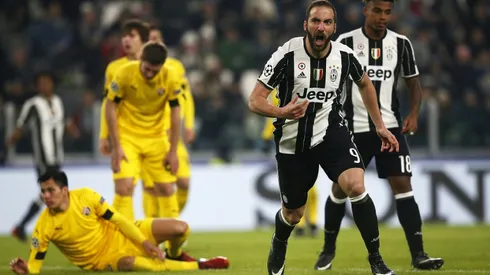 Higuain, Rugani strike as Juve secure top spot