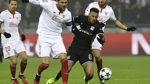 Sevilla withstand Lyon assault to reach last 16