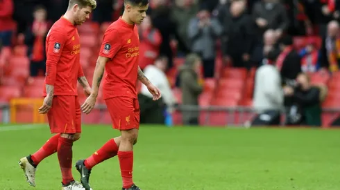 Liverpool out of FA Cup, Spurs survive Wycombe scare