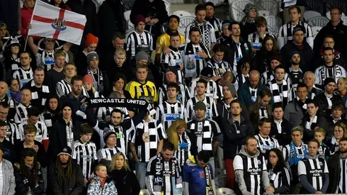 Newcastle flies back to top of table
