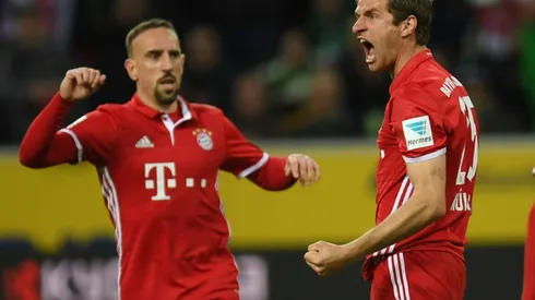 Bayern now 13 points clear as Mueller caps milestone