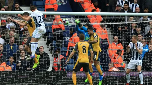 Dawson double darkens Wenger's Arsenal gloom