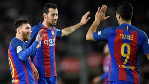 'MSN' send Barcelona top in Sporting rout