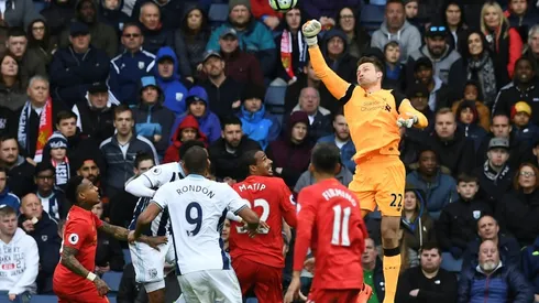 Klopp hails Mignolet as Liverpool close on Europe