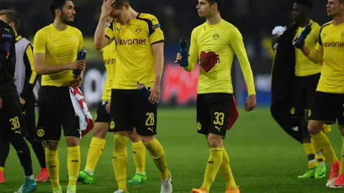 Rattled Dortmund seek solace after attack