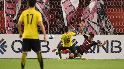 Paulinho the hero as Evergrande into last eight