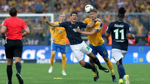 Wolfsburg win play-off to stay in Bundesliga