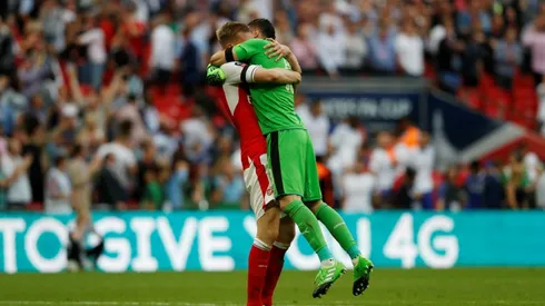 Mertesacker returns to inspire Arsenal's Cup glory