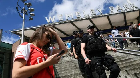 Armed police greet fans at UK sporting events after attack