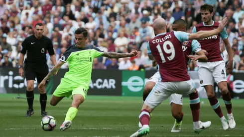 Coutinho masterclass lifts Liverpool back to third