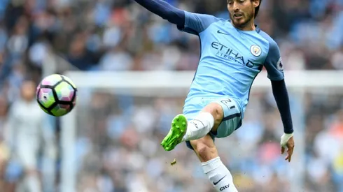 Silva stars as Man City thrash Palace to maintain Champions League bid