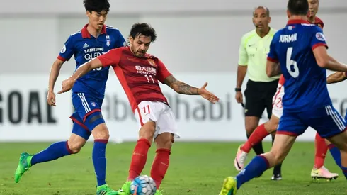 Goulart double puts Evergrande into knock-outs